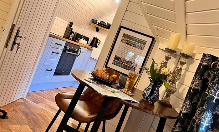 The cabins come with fully equipped kitchen and dining area perfect for two!